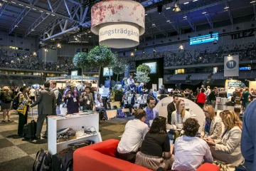Participants interacting with each other in the King's garden at World Water Week 2019