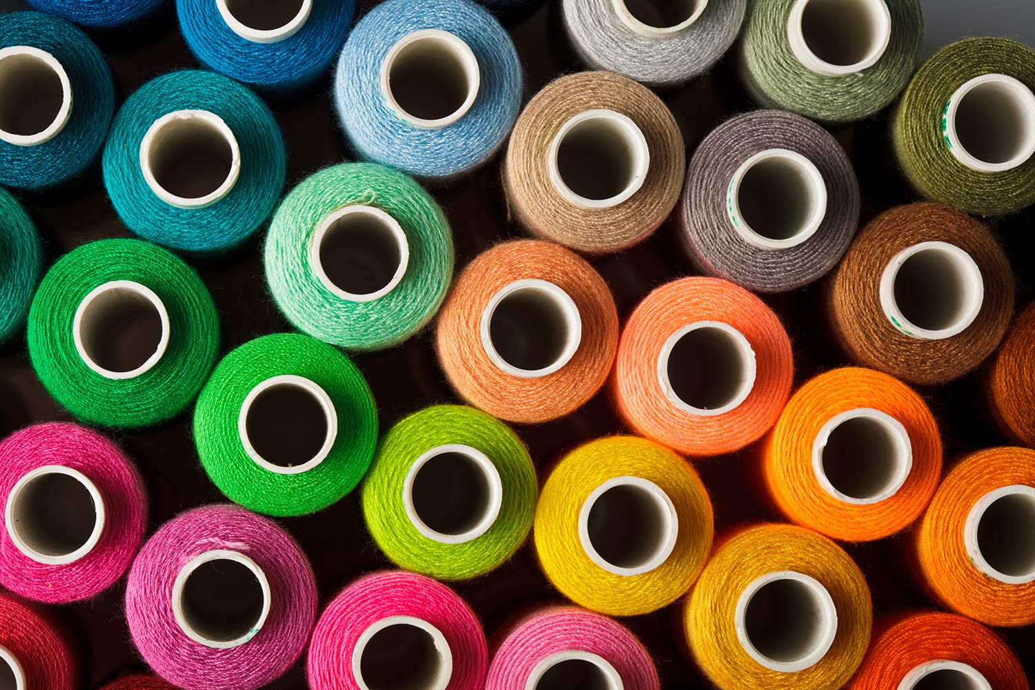 Multicoloured yarn bobbins.