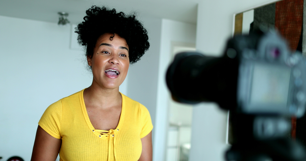 Woman,Giving,Testimony,In,Front,Of,Camera,Doing,Explainer,Video