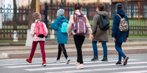 School,Children,Cross,The,Road,In,Medical,Masks.,Children,Go