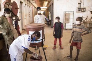 Handwashing demonstration by one child to others