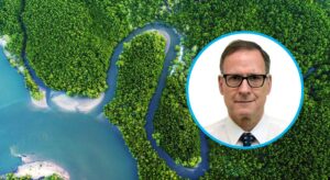 Portrait of Tom Panella over an aerial view of a river flowing into the forest and ending in a turquoise ocean